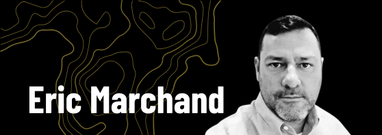 Header image showing portrait of Eric Marchand on the right, with his name in bold white text on a black background with gold contour lines.